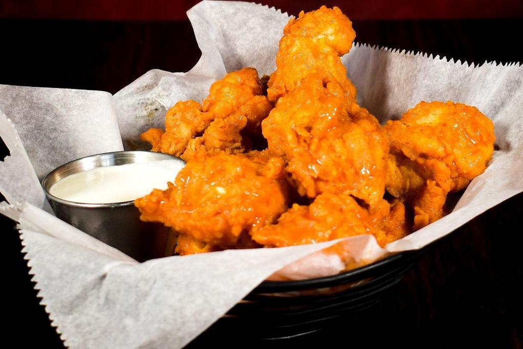 Boneless Wings · Boneless chicken hand-battered, fried and served naked or tossed in your choice of Buffalo sauce or Black Diamond Hot sauce.