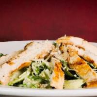 Lodge Chicken Caesar · Hearts of romaine & scratch baked garlic croutons tossed in Caesar dressing and topped with ...