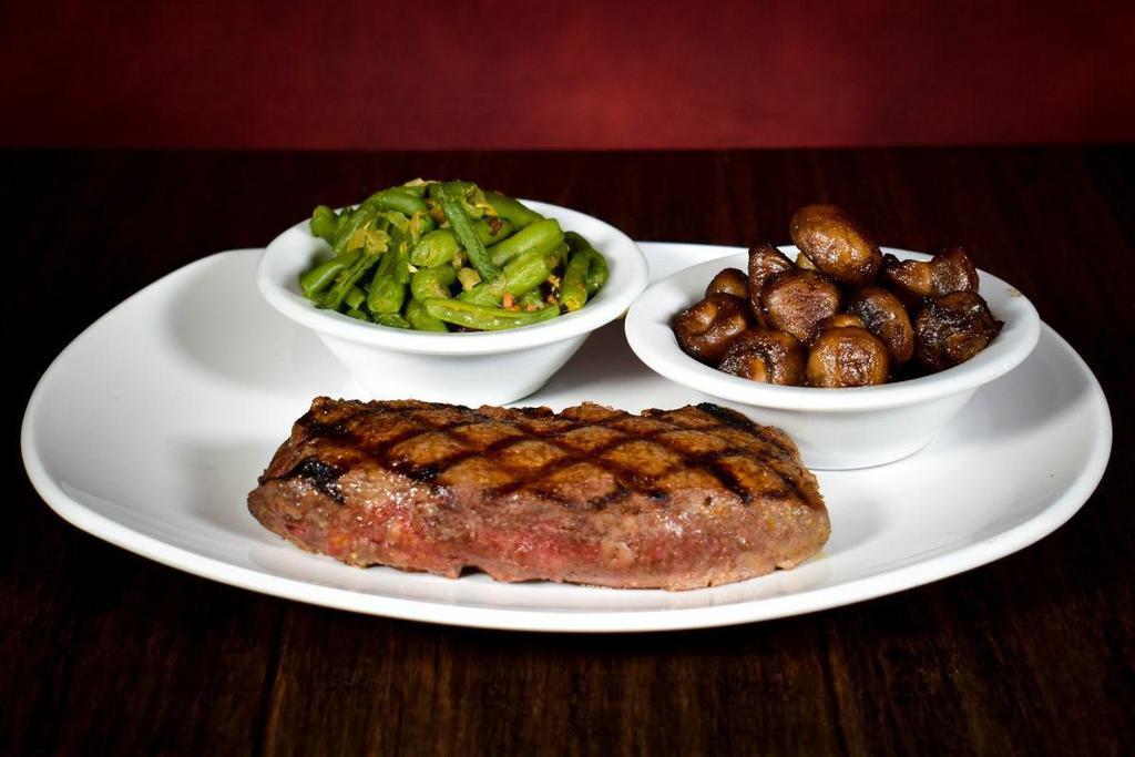 Usda Choice Sirloin · Hearty USDA choice sirloin hand-cut, seasoned and grilled to perfection. Served with your choice of two scratch made sides.