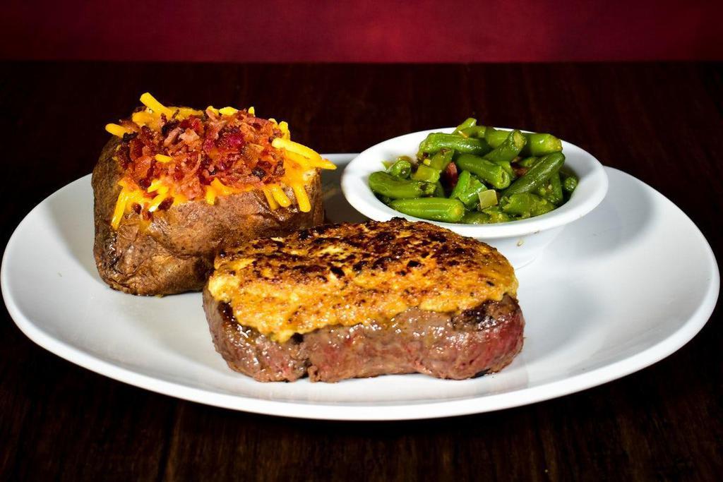 Aspen Bleu Sirloin · Hand-cut 10 oz. sirloin seasoned and grilled to perfection. Topped with a melted Bleu Cheese crust. Served with your choice of two scratch made sides.