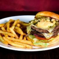 Hot Habanero Burger · Two quarter pound beef patties, jalapeños & onions sautéed in a spicy habanero sauce with ch...