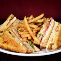 Traditional Club Sandwich · A triple-decker classic! Ham, turkey & bacon with American & jack cheese, lettuce, tomato & ...