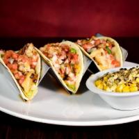 Grilled Fish Tacos · Seasoned grilled white fish, Pow Wow Sauce, shredded lettuce, pico de gallo, cheddar & jack ...