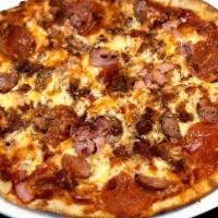 Cheesy Carnivore Pizza · Four meats (pepperoni, ham, bacon & Cajun sausage) covered in five cheeses.