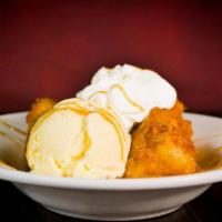 Fried Cheesecake · Lightly fried and sprinkled with cinnamon sugar then topped with vanilla ice cream, caramel ...
