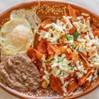 Chilaquiles · With corn tortilla, egg, pico de gallo and cheese.