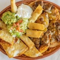 Botana · Quesadillas, flautas, beef or chicken, nachos, beans, rice, sour cream, guacamole.