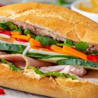 Traditional Vietnamese Banh Mi · Vietnamese ham, Special ham, pate. Served with jalapenos, pickled carrots, cilantro, garlic ...