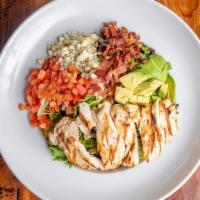 The Cobb · Mixed green with grilled chicken breast, diced bacon, avocado, tomatoes, bleu cheese crumble...