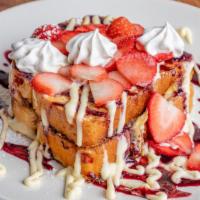 Stuffed French Toast · Two pieces, filled and topped with homemade cream cheese, topped with fresh strawberries or ...