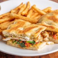 Donika'S Panini · Grilled chicken breast with roasted red peppers, spinach, roasted tomatoes, feta cheese, and...