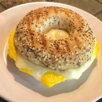 Breakfast Bagel · Toasted bagel of your choice, Egg, and
American Swiss cheese