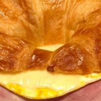 Breakfast Ham Croissant · HamEgg, and melted
American Swiss Cheese on a lightly
toasted fresh croissant