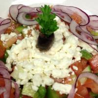 Astoria Salad · Fresh chopped vegetables salad. Cucumbers, Tomatoes, and
Green Bell Peppers, topped with Red...