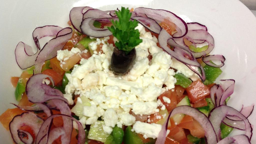 Astoria Salad · Fresh chopped vegetables salad. Cucumbers, Tomatoes, and
Green Bell Peppers, topped with Red Onion, and crumbled Feta, tossed in the House olive oil red wine vinegar dressing