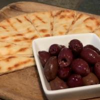 Olives + Pita · Greek Kalamata Olives served with warm Pita Bread