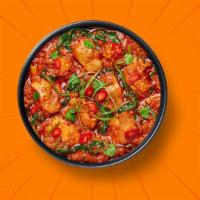 Chicken Vindaloo Fusion · Tender pieces of chicken cooked in a hot and tangy curry made with dried red chilies, crushe...