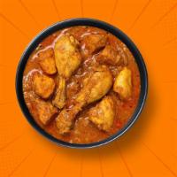 Capital Chicken Curry · Bone in/ boneless chicken pieces simmered in a brown onion and tomato curry, seasoned with f...