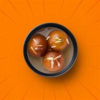 Sinful Gulab Jamun · Soft cottage cheese dumplings steeped in rose and cardamom syrup.