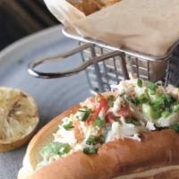 King Crab Roll · Alaskan king crab, toasted split roll, citrus aioli, celery, chives, grilled lemon, served w...