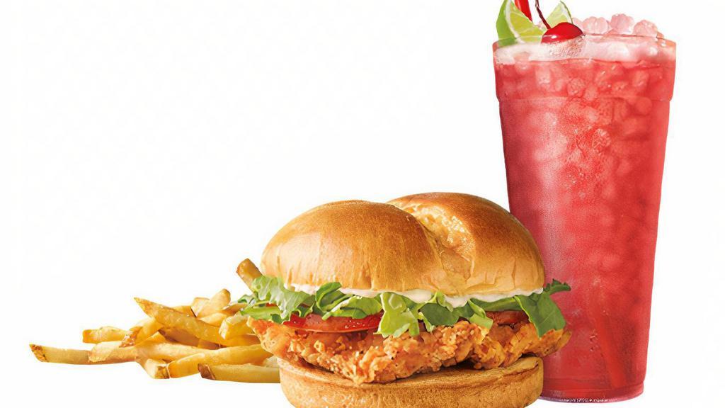 Classic Crispy Chicken Sandwich Combo · Lightly seasoned and breaded 100% all white meat chicken breast topped with fresh lettuce, ripe tomatoes and mayo; served on a warm Brioche bun. Even better with a Side and Drink included!