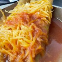 Rolled Tacos · Three rolled tacos served in a delicious tomato sauce and topped with shredded cheese.
