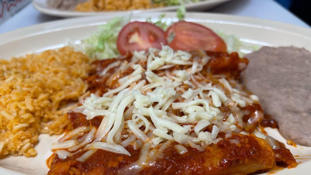 Enchilada Plate · Three cheese enchiladas. Served with rice, refried beans, and a flour tortilla.