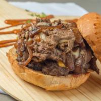 Philly Cheese Burger · flame grilled beef patty with American Cheese,Philly Steak, Grilled Onions,lettuce,Fanoosh S...