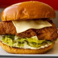 Catfish Supreme · Lightly seasoned and battered catfish filet on a brioche bun with lettuce and tarter sauce.