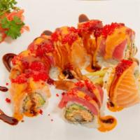 Tokyo Roll (Hot) / 东京卷 · Tempura shrimp, spicy crab, cucumber, and avocado. Topped with tuna and salmon, finished wit...