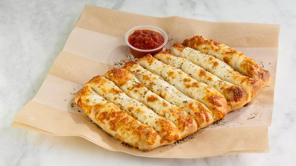 Cheesy Breadsticks · Served with organic red sauce or buttermilk ranch