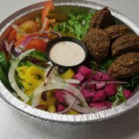 Falafel Salad · Lettuce, tomatoes, cucumbers, onions, black olives, and Feta cheese.