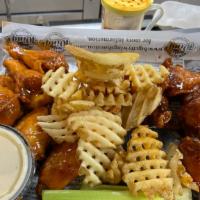 Wing Basket · 10 wing basket in your choice of sauce. Served with waffle fries, choice of Ranch or Bleu ch...