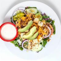 Southwest Avocado Salad · Fresh lettuce tossed with cucumbers, onions, avocado, carrots, croutons, and cheddar cheese,...