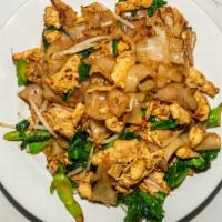 Pad See Ew · Flat rice noodles, Chinese broccoli, egg, and bean sprouts in a black, semi-sweet soy sauce....