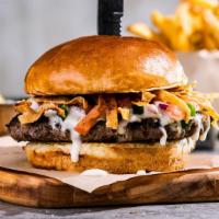 Queso Burger (Classic) · White queso, crunchy tortilla strips, pico. 950 cal. **Disclaimer: may be cooked to order. C...