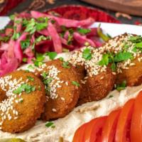 Falafel Plate  · 6 pieces with 1 pita bread,(Does not come with hummus)