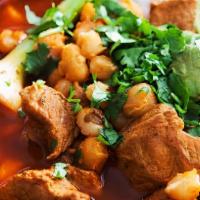 Pozole · Traditional Mexican pozole is a rich, brothy soup made with pork, hominy & red chiles. Pile ...