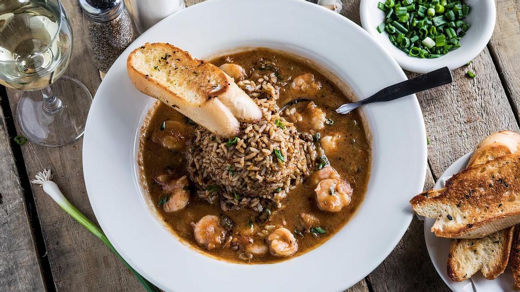 Mid-Day Etouffee · Choice of shrimp, crawfish  or chicken in a rich, dark roux sauce. Dirty rice.