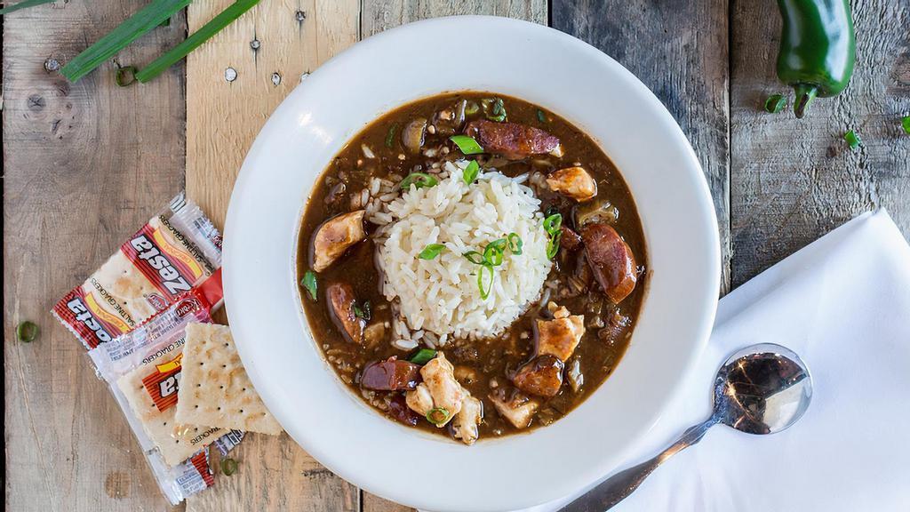 Gumbeaux & Salad Combo · Cup of our famous gumbo paired with a chopped salad.