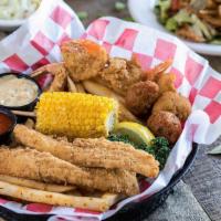 Shrimp And Catfish Combo · Two favorites hand battered, hand seasoned and perfectly fried. Served with Cajun seasoned f...