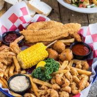 Seafood Combo Platter · Shrimp, catfish and crawfish. Hand battered, hand seasoned and perfectly fried. Served with ...