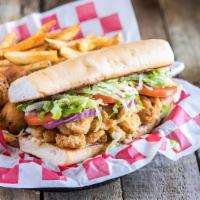 Fried Shrimp Po'Boy · Fried shrimp on a toasted French roll, with all the fixins, Cajun seasoned fries and jalapeñ...