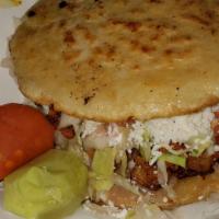 Gordita · gordita traditional  on corn   with choice of meat , filled with beans, lettuce, avocado sou...