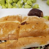 Torta Regular  · choice of meat mix with grill onions refried beans cheese,tomato,avocado lettuce and chipott...