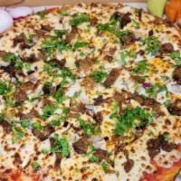 Pizza Birria  · 12 inch   our pizza and traditional  sauce top with cheese and our juice birria meat 
top wi...