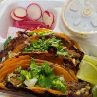 Tacos De Birria (No Cheese ) · choice of torilla with birria meat and cilantro, and or onion with dipping sauce served with...
