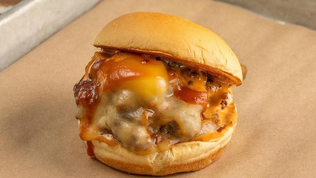 Burnt Ends · Wagyu Beef, Gouda Cheese, Brisket Burnt Ends, Chili Mayo, BBQ Sauce, Caramelized Onions
