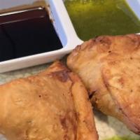 Vegetable Samosa · Popular nepali turnover stuffed with mildly spiced peas and potatoes.