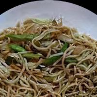 Noodles Sadeko · Steamed noodles marinated in onion, green chili, spring onion, roasted peas, cilantro, lime ...